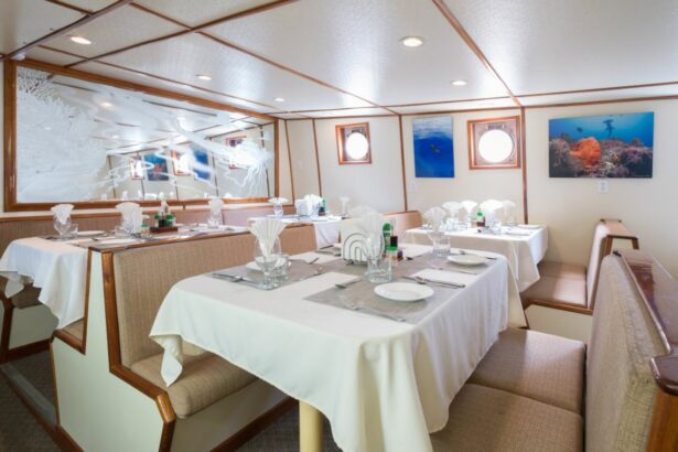 Tables set for dinner in the Sea Hunter's booth-style dining room