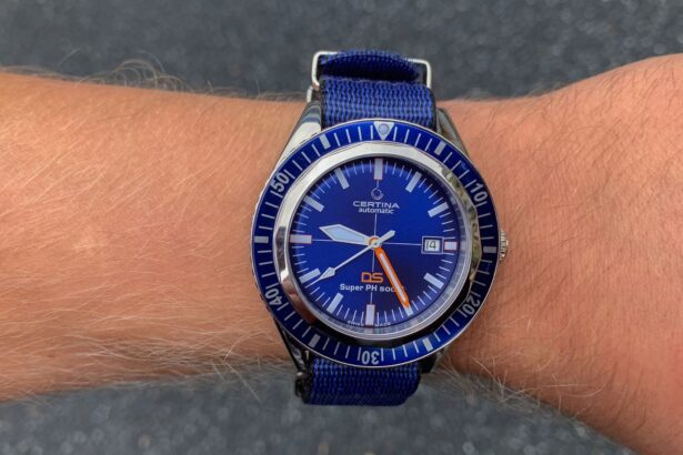 Certina DS Super PH500M automatic dive watch with blue dial and blue NATO strap on our tester's wrist