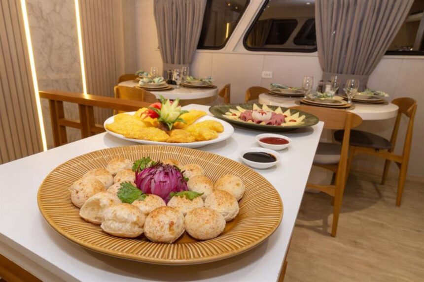 Dining tables set with plates and napkins in the Galaxy Diver's indoor dining area
