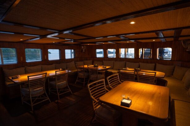 Wooden dining tables and chairs in the Pindito's indoor salon