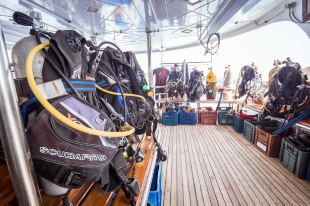 Rows of scuba diving gear and BCDs set up on the Emperor Asmaa's dive deck