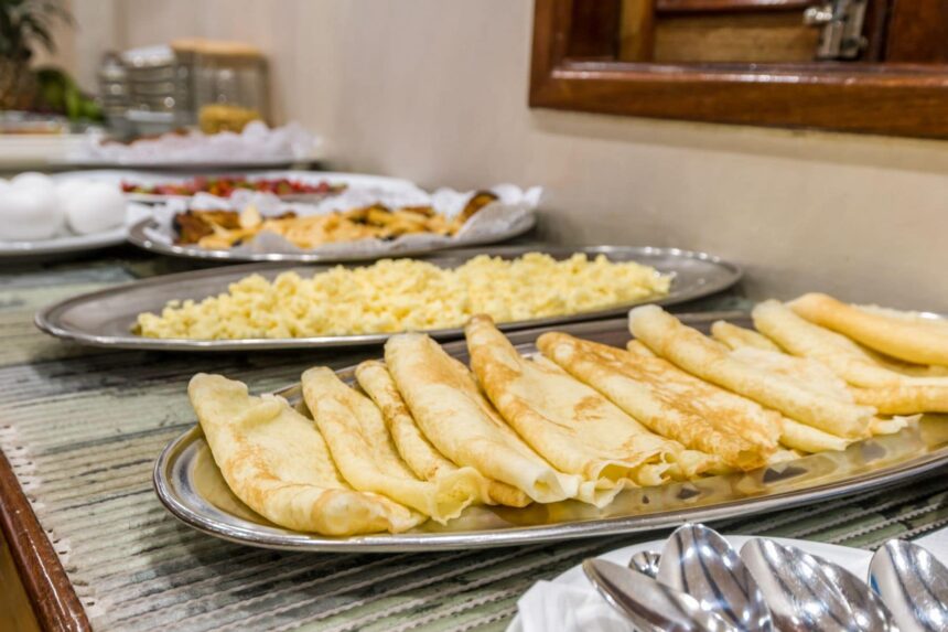 Buffet spread of crepes, scrambled eggs and cold cuts aboard the Emperor Asmaa