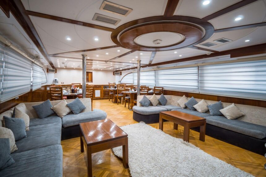 Grey sectional sofas and coffee tables in the Emperor Asmaa's indoor lounge