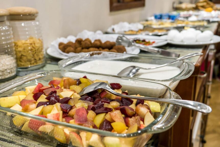 Fresh fruit salad and yogurt laid out on the Emperor Asmaa's buffet table