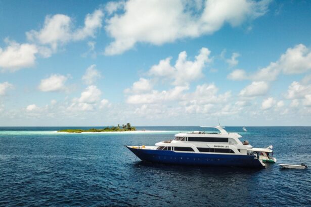 Emperor Leo liveaboard yacht anchored near a small sandbar island