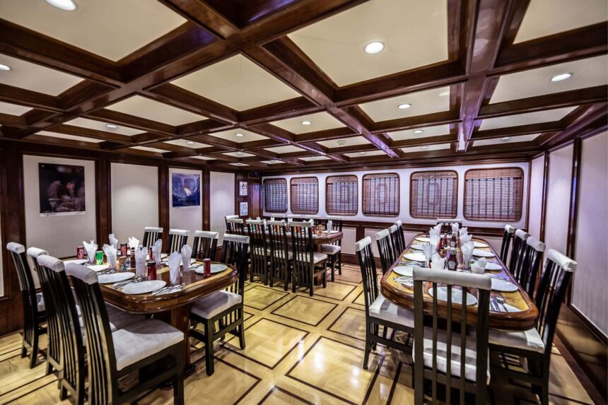 Formal dining room aboard the Emperor Superior set with place settings