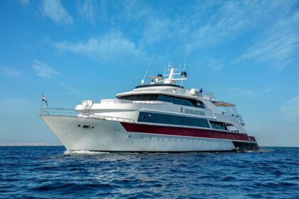 Emperor Superior liveaboard yacht underway leaving a wake at sea