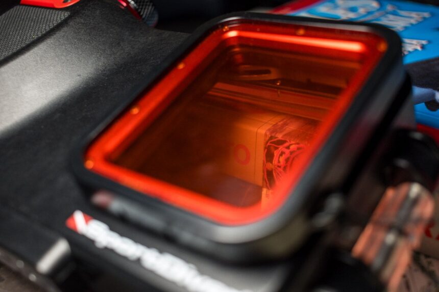 Close-up of the SportDiver's glass lens port with the red filter fitted over it