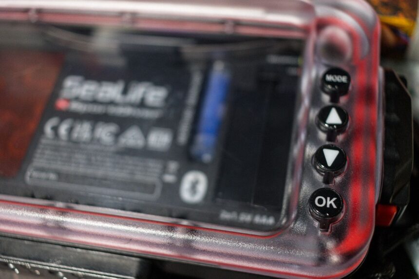 Close-up of the mode, arrow and OK buttons on the SportDiver's clear back panel