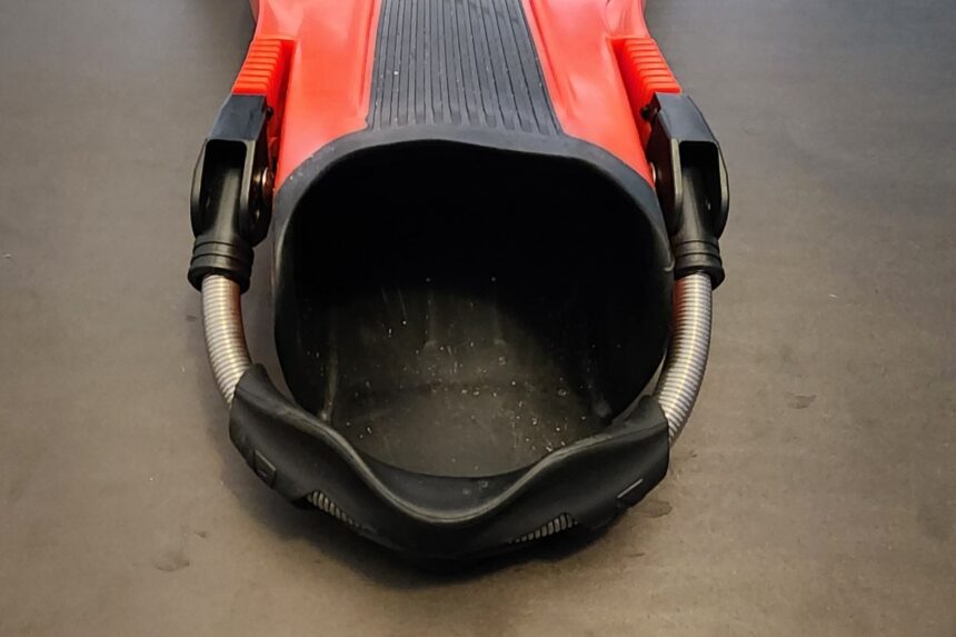 Open foot pocket of the Dive Rite XT fin with its stainless spring straps and heel pad