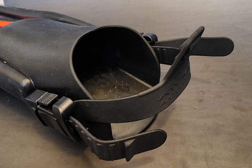 Close-up of the open foot pocket and rubber heel strap on an Atomic Aquatics SplitFin
