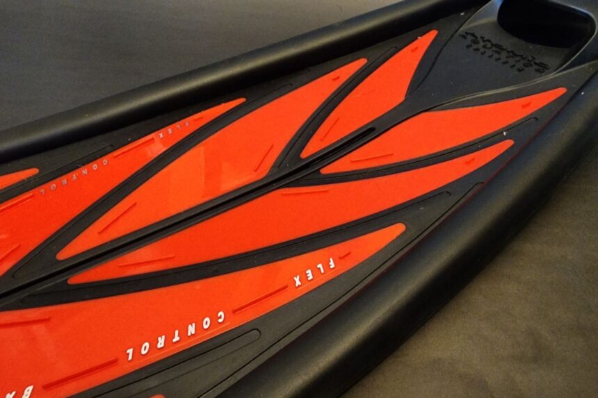 Angled close-up of the red and black blades of the Atomic Aquatics SplitFins