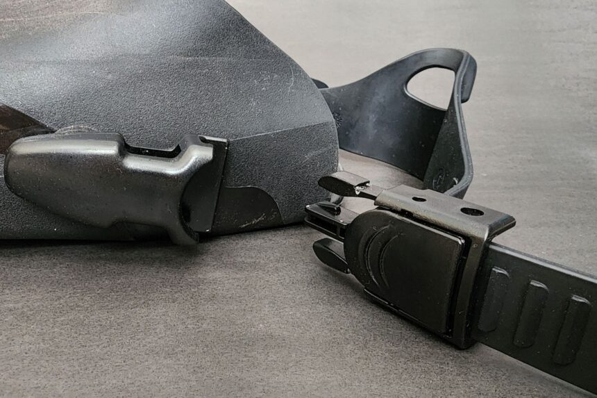 Unclipped EZ strap buckle and ladder strap alongside the TUSA Solla foot pocket