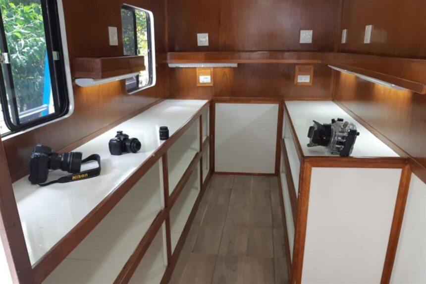 Camera setup room aboard The Smiling Seahorse with Nikon cameras on a bench