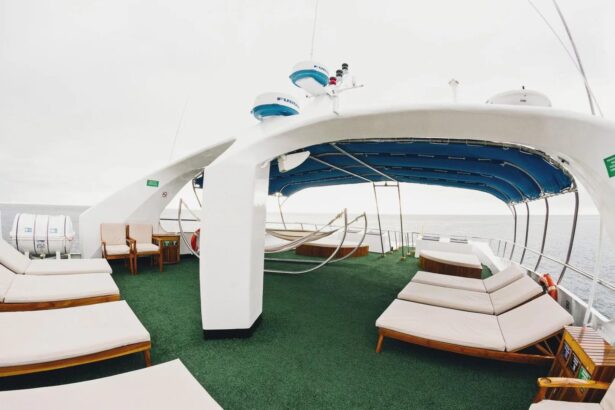 green astroturf sundeck with lounge chairs and hammocks on the Galapagos Sky