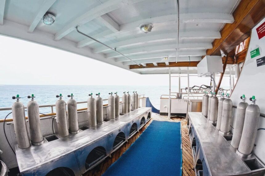 nitrox tanks lined up on the dive deck of the Galapagos Sky liveaboard