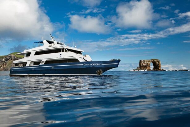 the Galapagos Sky liveaboard anchored near Darwin's Arch rock formation