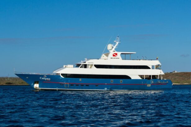 the Calipso liveaboard yacht seen from the side on calm water