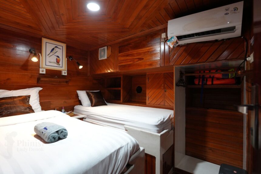 twin cabin with wall mounted air conditioning unit aboard Lady Denok