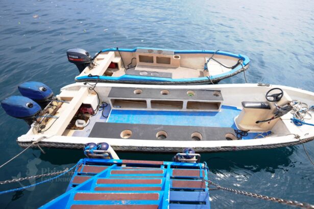 two small tender boats moored together off Lady Denok