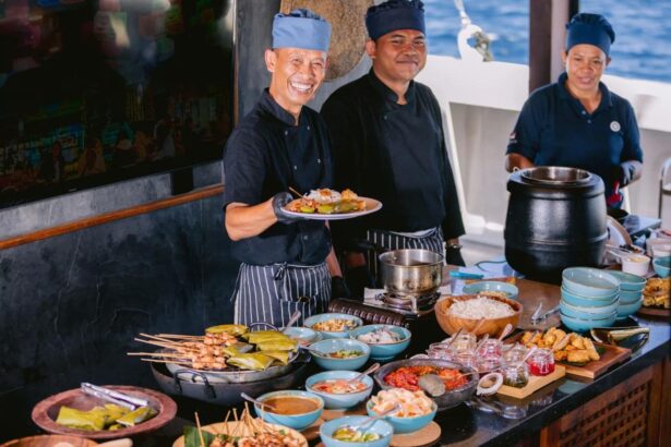 Scubaspa Zen chefs serving a spread of grilled skewers and buffet dishes