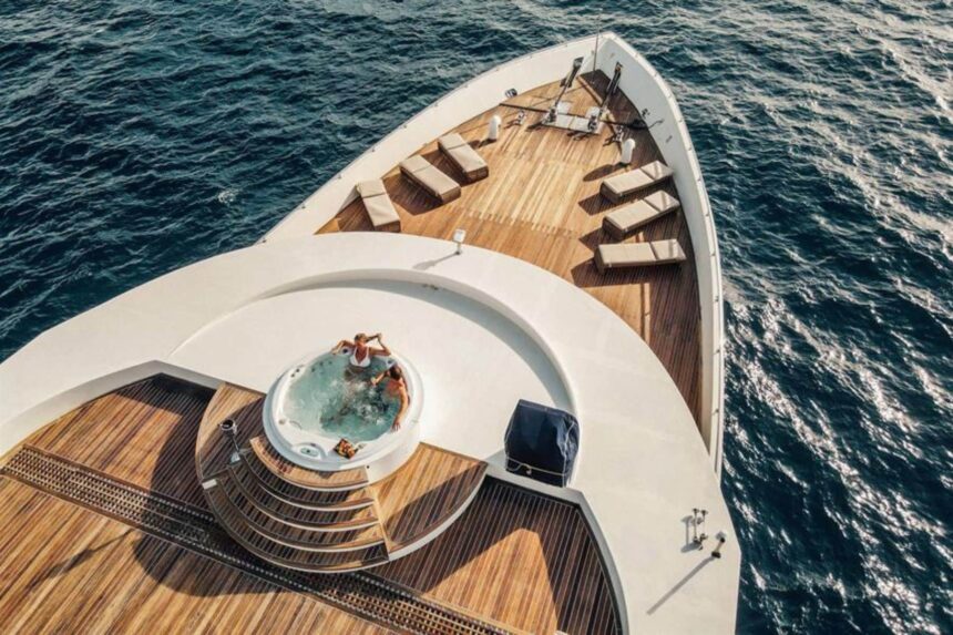 Aerial view of a hot tub and sun loungers on Scubaspa Yang's bow deck