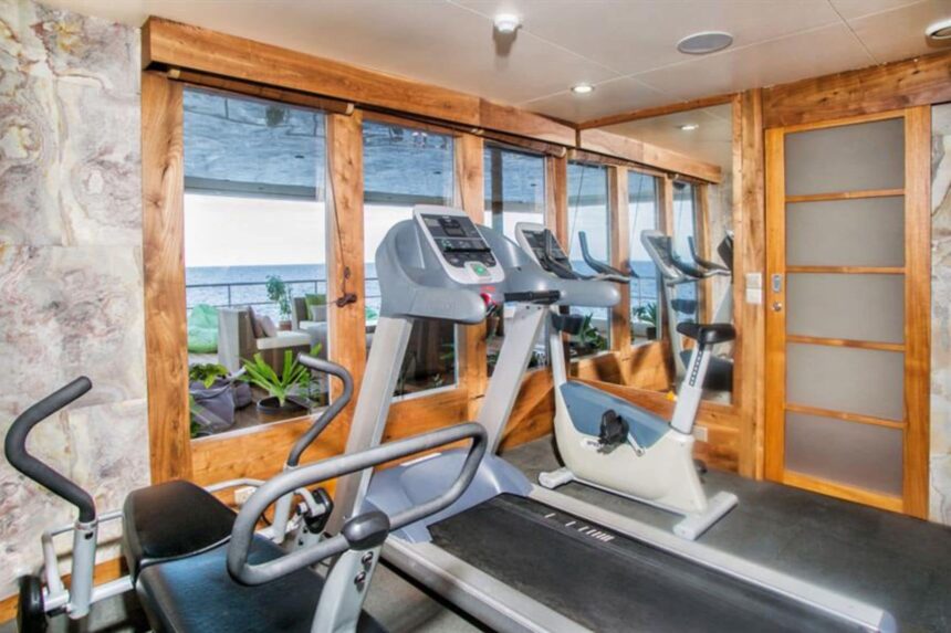 Treadmill and exercise bikes in the onboard gym aboard Scubaspa Yang