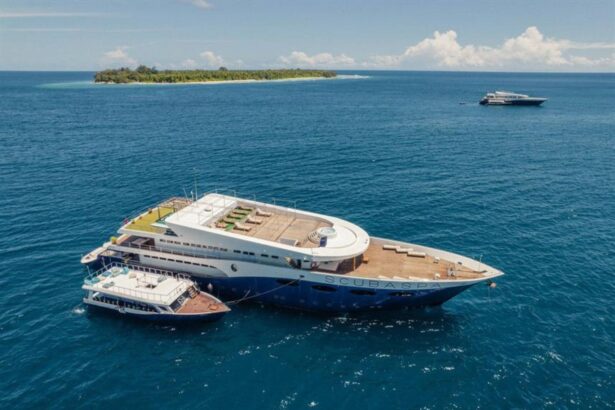 Aerial view of Scubaspa Yang anchored near a small island in the Maldives