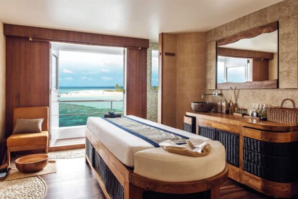 Spa treatment table facing an open balcony with ocean views aboard Scubaspa Yang