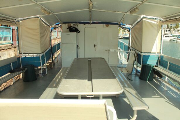Covered dining and lounge tables on the deck of MV SeaEsta at dock