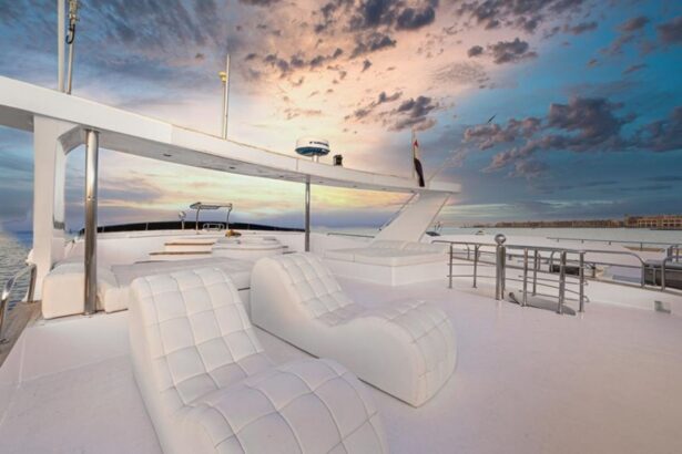 White cushioned loungers on the Aphrodite's deck at dusk