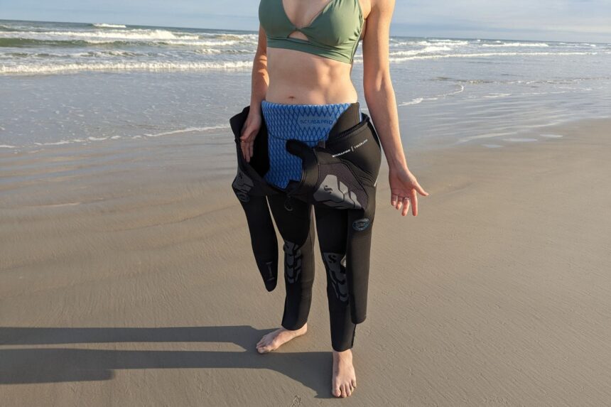 DIVEIN tester with the ScubaPro Everflex Yulex wetsuit pulled down to the waist, blue lining showing
