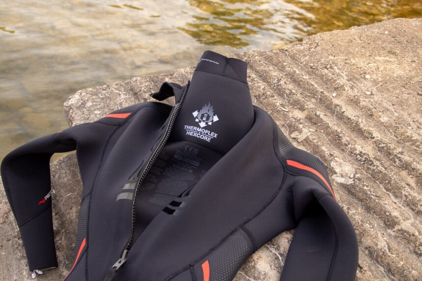 Interior of the Fourth Element Proteus II wetsuit showing the Thermoflex Hexcore lining label