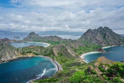 Elevated view of Padar Island's curved bays, pale beaches and green ridges in Komodo, Indonesia