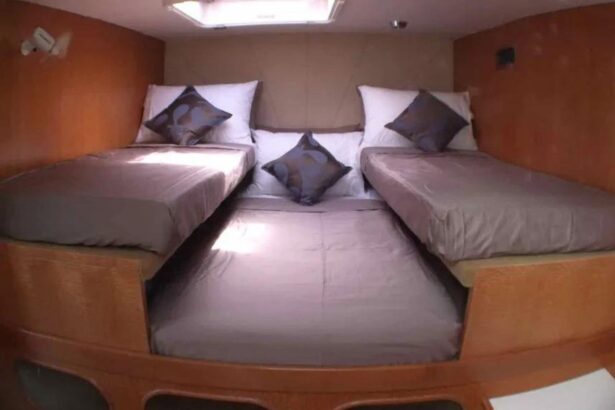 A twin-bed cabin aboard the Shore Thing catamaran