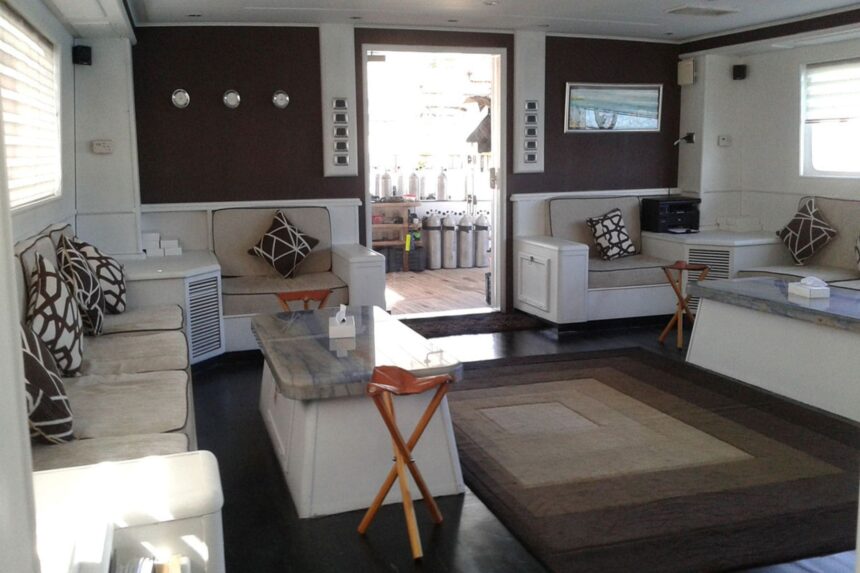 Lounge seating and dining nook aboard the Aldebaran liveaboard