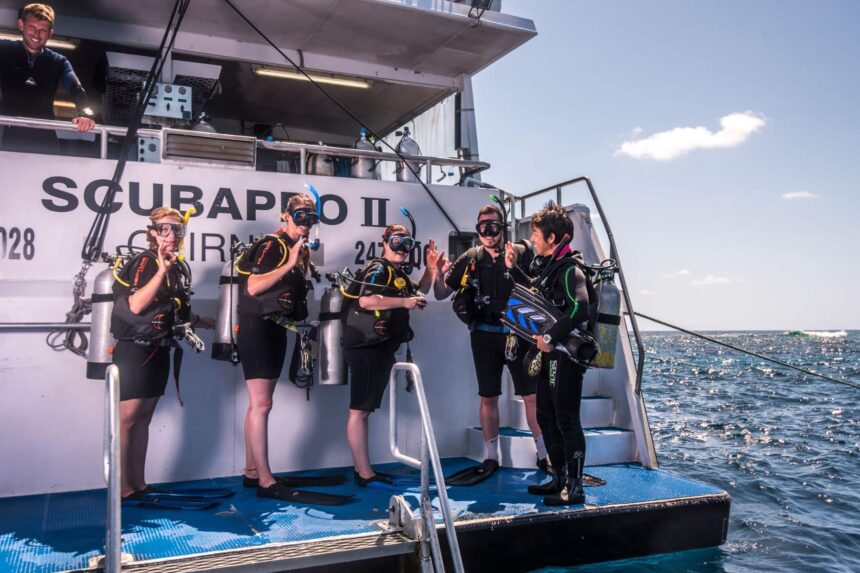 Divers gearing up on the back deck of the Scubapro II
