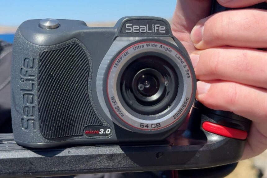 Close look at the SeaLife Micro 3.0 body and wide-angle lens ring in our tester's hands