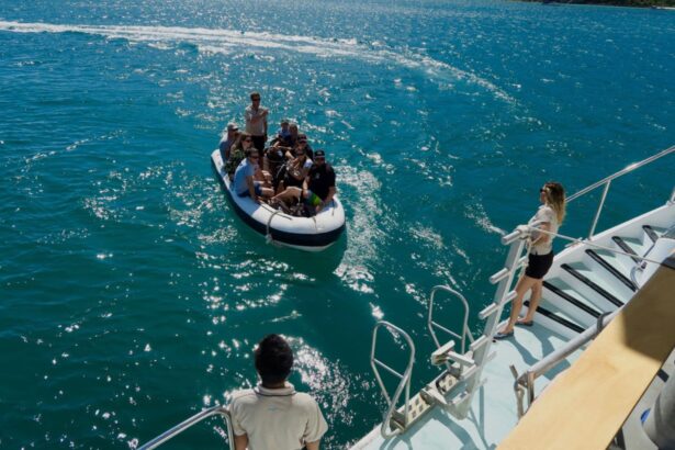 Tender dinghy loaded with divers heading toward the Spirit of Freedom liveaboard