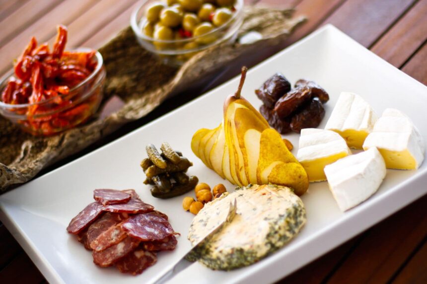 Charcuterie and cheese platter served aboard MV Great Escape