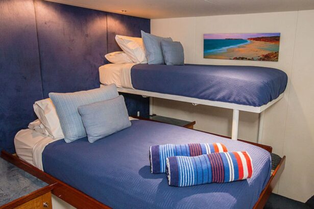 Bunk style cabin with two beds aboard MV Great Escape