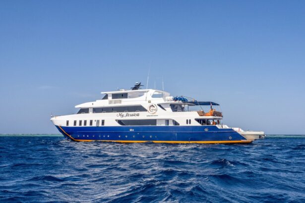 Side profile of the Titan liveaboard underway on open water