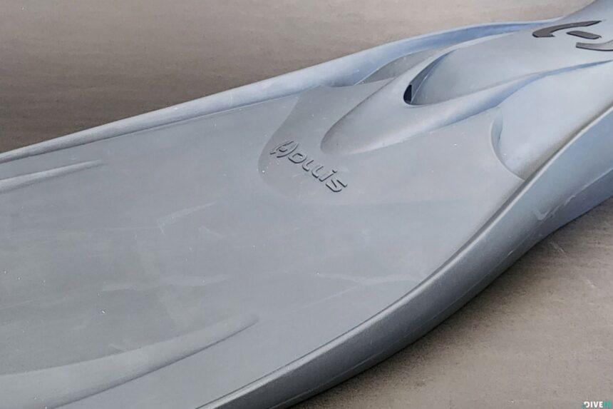 Underside of the grey Hollis F1 LT fin blade with its scooped channels and squared tip