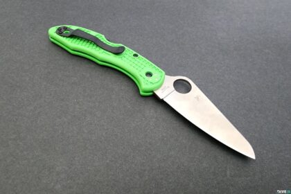 Spyderco Salt 2 folding dive knife open, green handle with plain edge blade and thumb hole