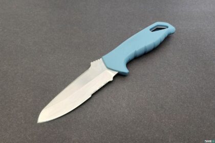 Benchmade Undercurrent dive knife with light blue handle and partly serrated drop point blade