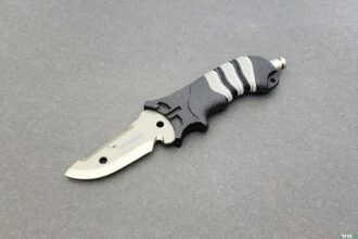 Promate Sharp Tip titanium BC dive knife with black and white grip and pointed titanium blade