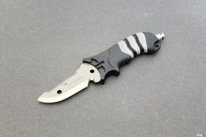 Promate Sharp Tip titanium BC dive knife with black and white grip and pointed titanium blade