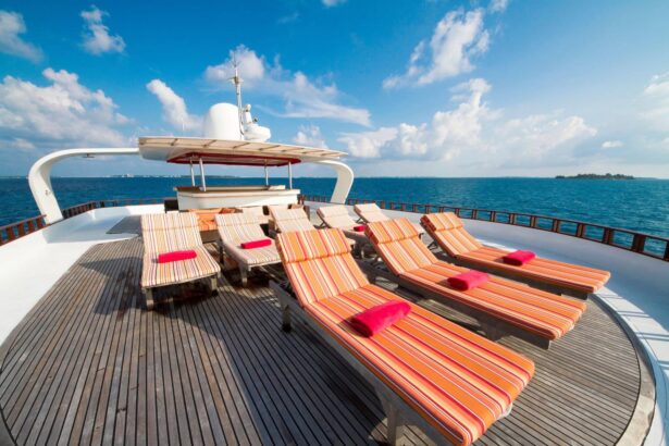 Orange striped sun loungers set out on MV Theia's foredeck