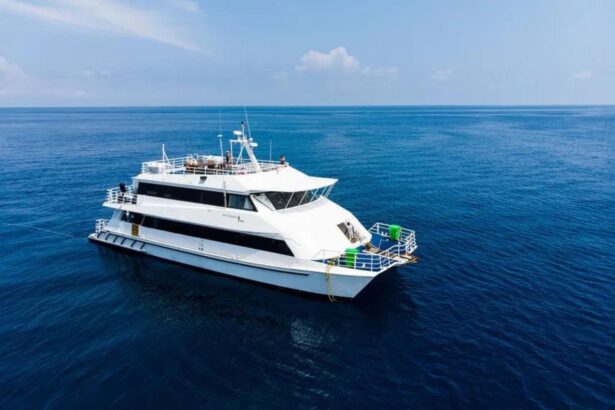 MV Oceania catamaran liveaboard cruising across open blue water