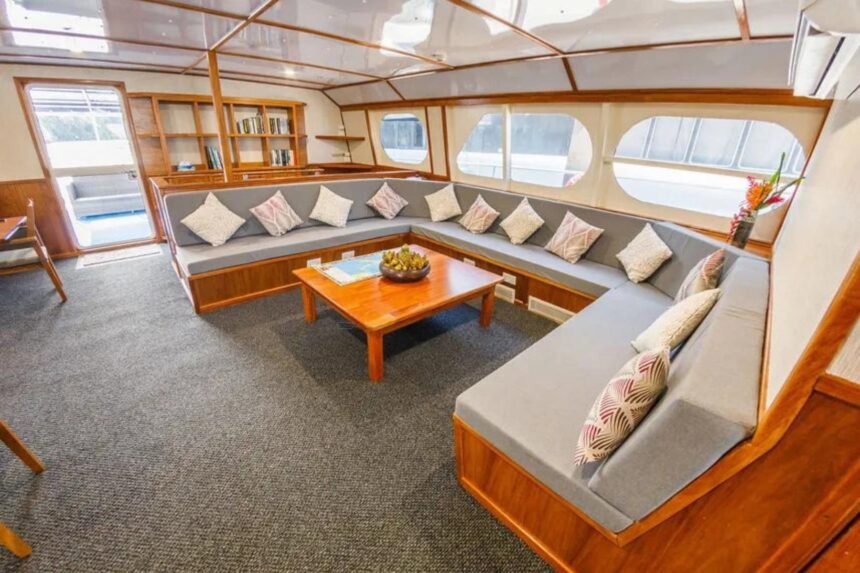 Sectional lounge seating with patterned cushions inside MV Oceania